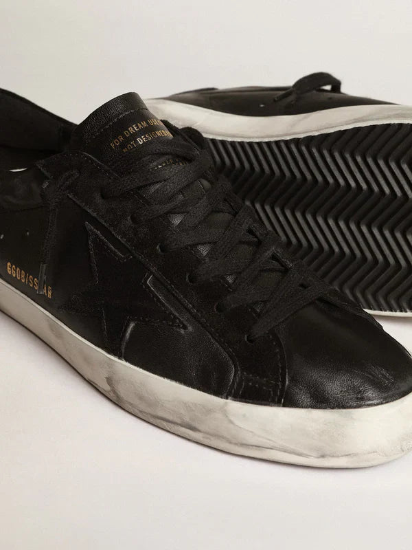 Super-Star in black nappa leather with a suede black star and heel tab