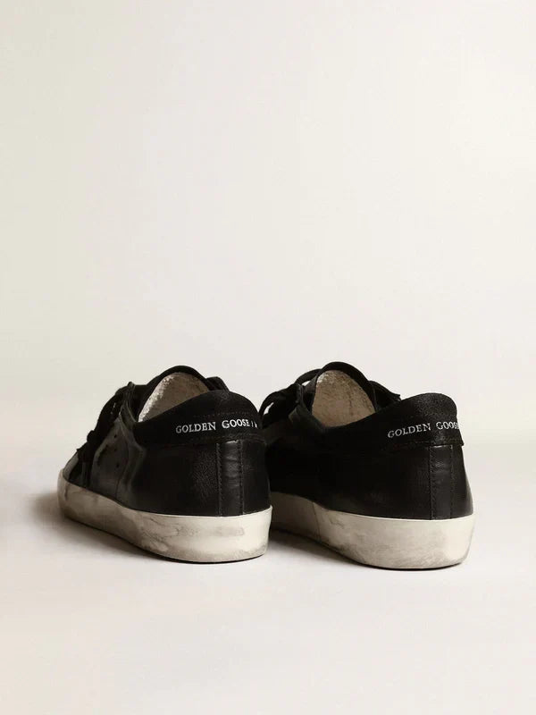 Super-Star in black nappa leather with a suede black star and heel tab 46
