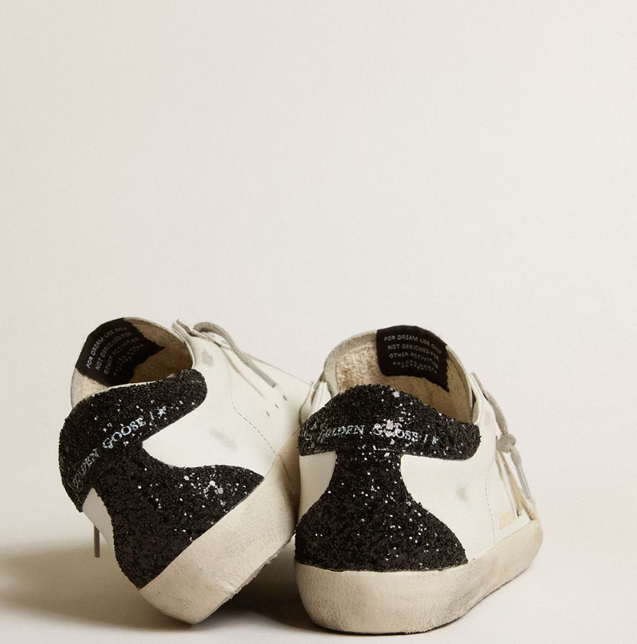 Super-Star Women with a gold star and black glitter reinforcement