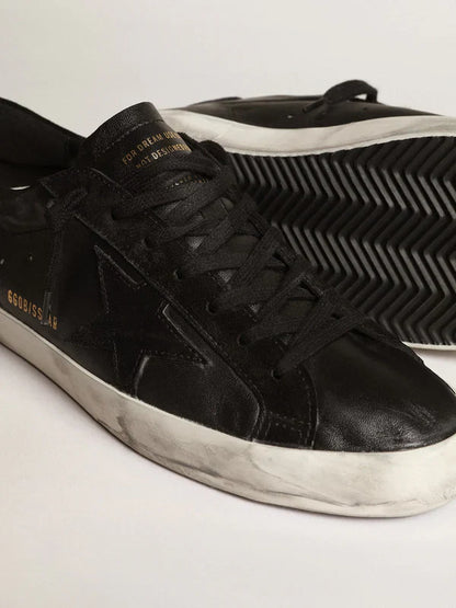 Super-Star in black nappa leather with a suede black star and heel tab