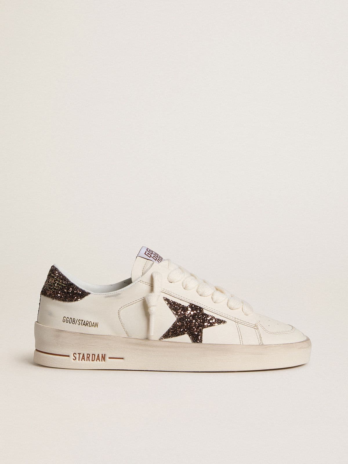 Stardan in nappa leather with a glitter star and brown leather heel tab