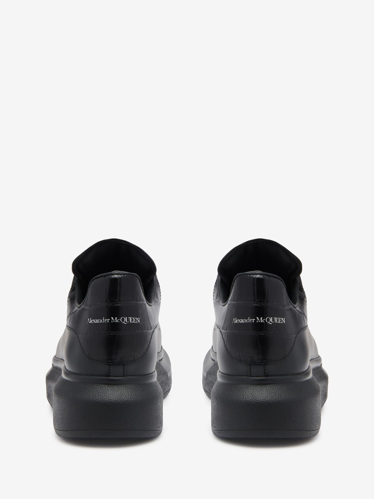 Oversized sneakers in black and white crocodile
