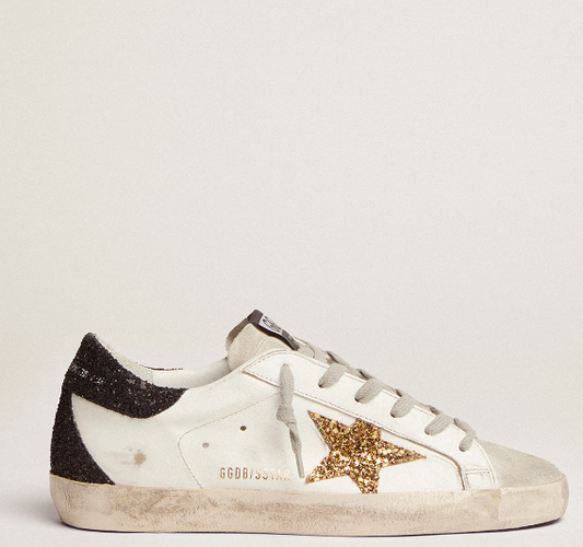 Super-Star LTD with a gold star and black glitter reinforcement