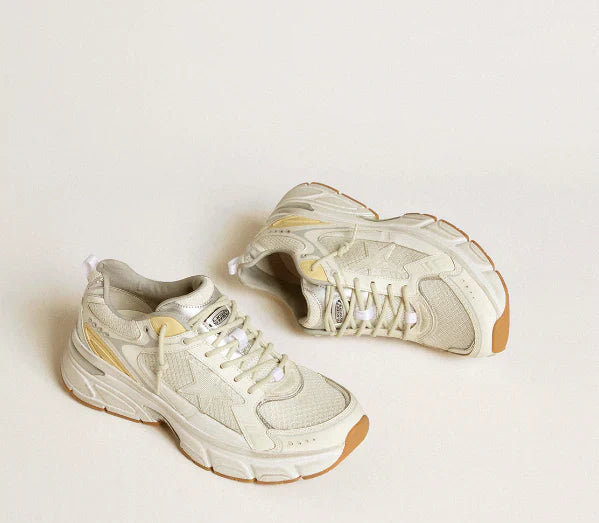 Lightstar Women in white leather and mesh with a lived-in white star